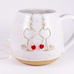 Kissakorvakorut - messinki