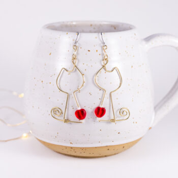 Kissakorvakorut - messinki