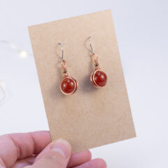Orange beads earrings - copper